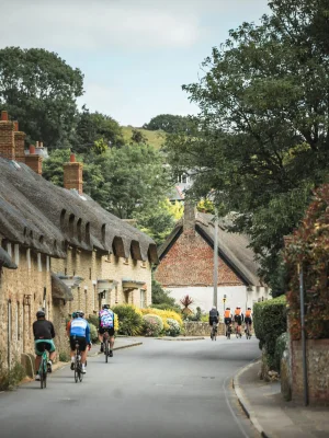 cyclists riding downhill in Lulworth
