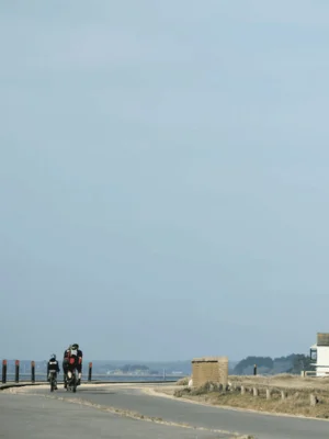 cyclists at the beach