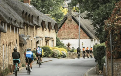 Cyclists riding down a country lane